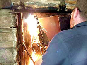 man working on firebox