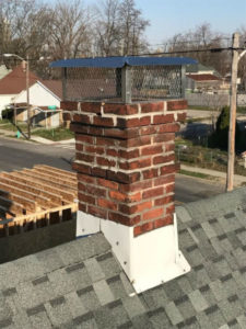 masonry chimney with stainless steel chimney cap