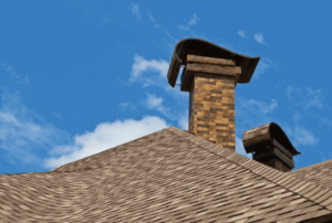 masonry chimney with a blue sky background