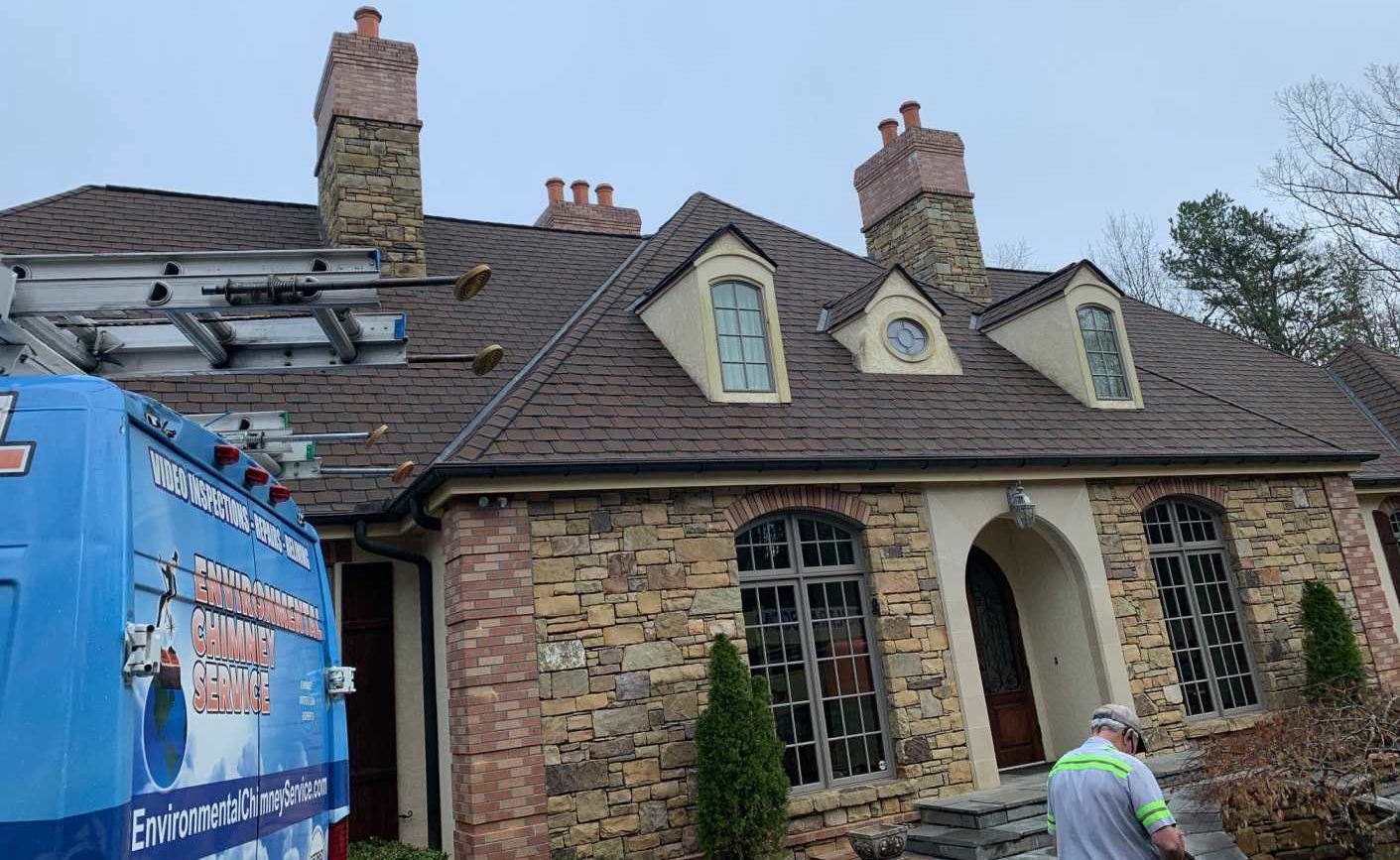 Original Photo-Referral Program.-Environmental Chimney Service - Asheville NC back of truck with ladder on top and house