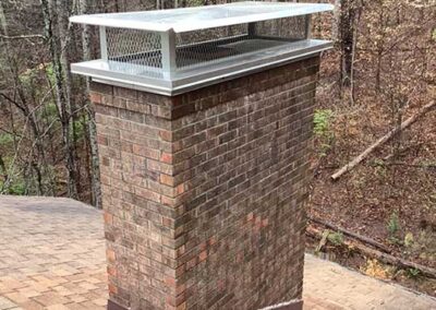 New chimney cap on a masonry chimney